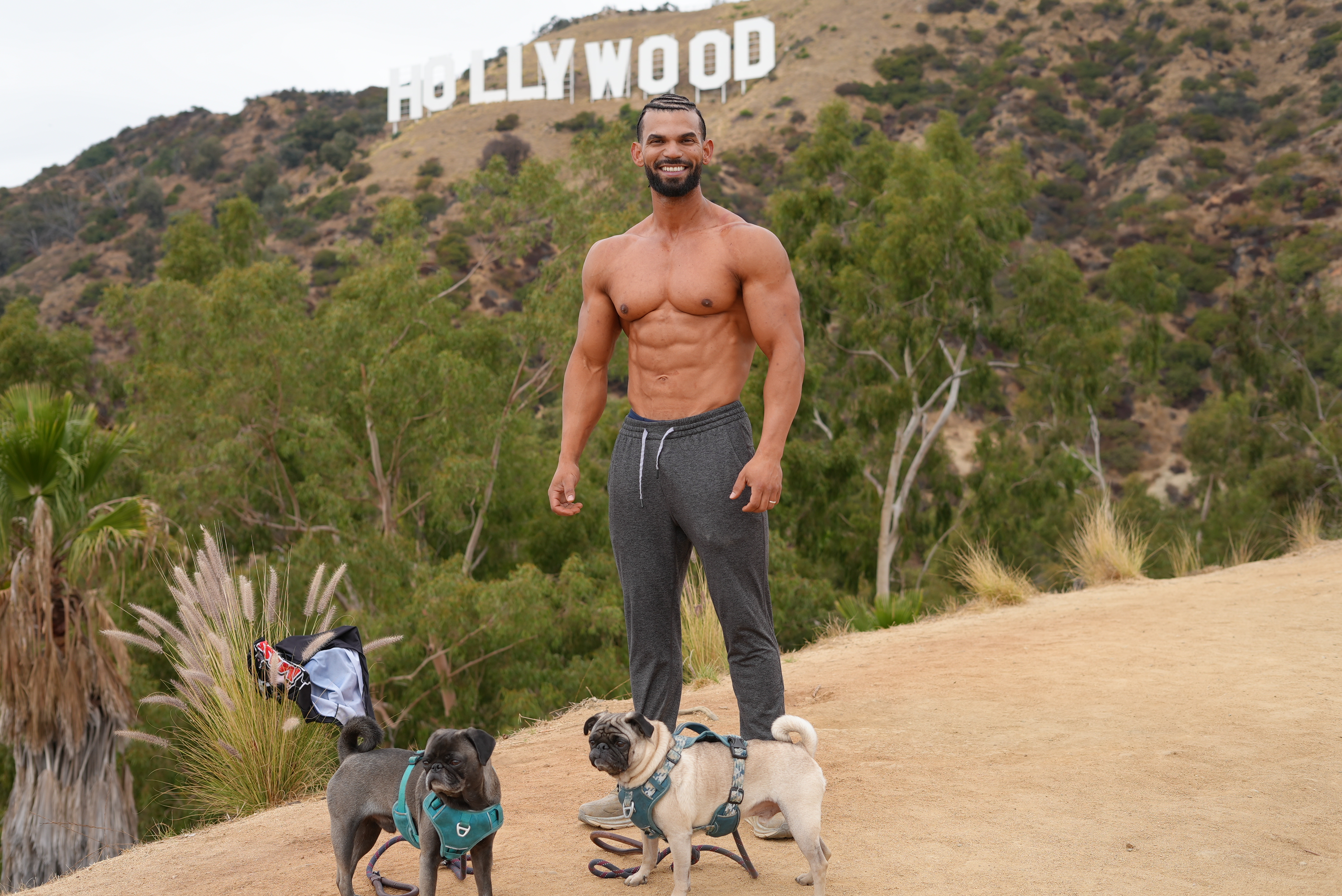 Davi with his pugs